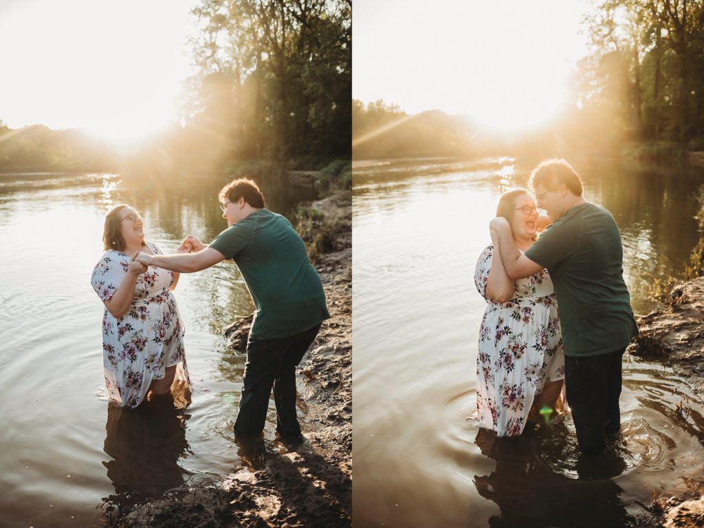 engagement pictures in Lafayette Indiana - man and woman dancing in the water at romantic engagement photos at Wildcat Creek Park during sunset