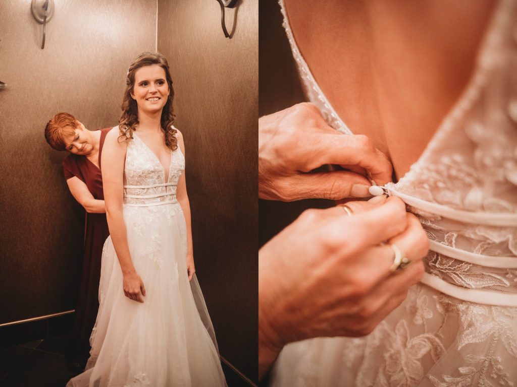 Mother helping bride get into her gown for the Monticello, Indiana Wedding. 
