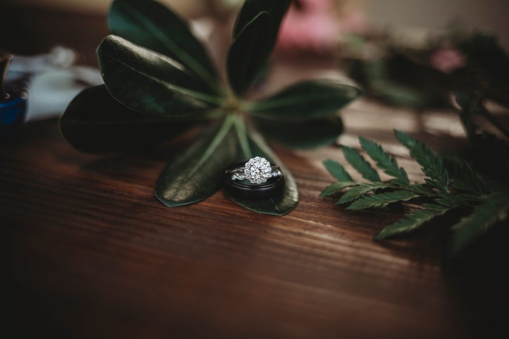 Rensselaer Indiana Wedding Photographer - engagement ring on leaves from brides bouquet in rensselaer indiana wedding