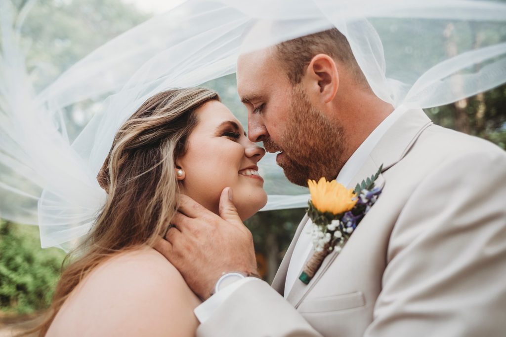 Rensselaer Indiana Wedding Photographer - bride and groom sharing an almost kiss in rensselaer indiana 