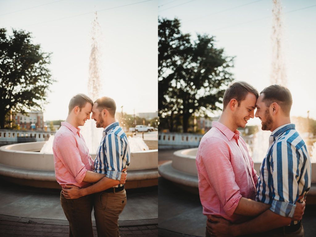 LGBTQ couple holding each other smiling during their Indiana LGBTQ engagement session. 
