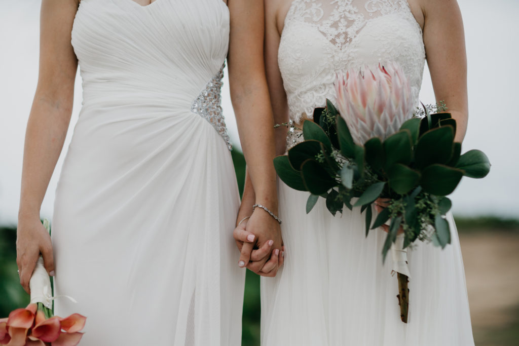 Indianapolis Videographer// Our Biggest Elopement Regret  - woman and woman holding hands in st. thomast, USVI elopement.