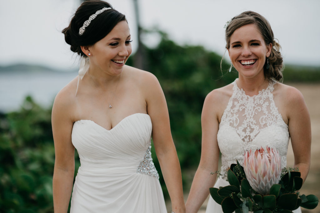 Indianapolis Videographer// Our Biggest Elopement Regret  - two brides holding hands in st. thomas, USVI. 
