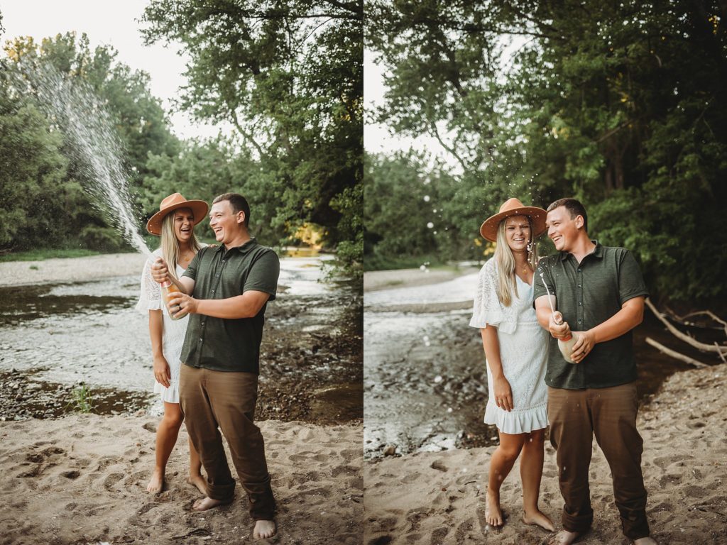 Fairfield Lakes Park Anniversary Session in Lafayette, Indiana //Zyan + Hunter- Man popping champagne with wife at Fairfield Lakes Park in lafayette, Indaian