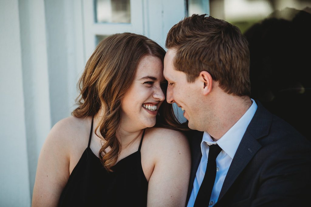 Newfields Engagement Session// Michelle + Adam - Couple gazes at each other with huge smiles.