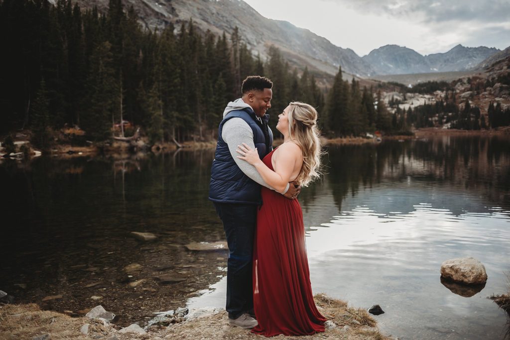 Breckenridge Engagement Session-couple staring at each other in breckenridge colorado