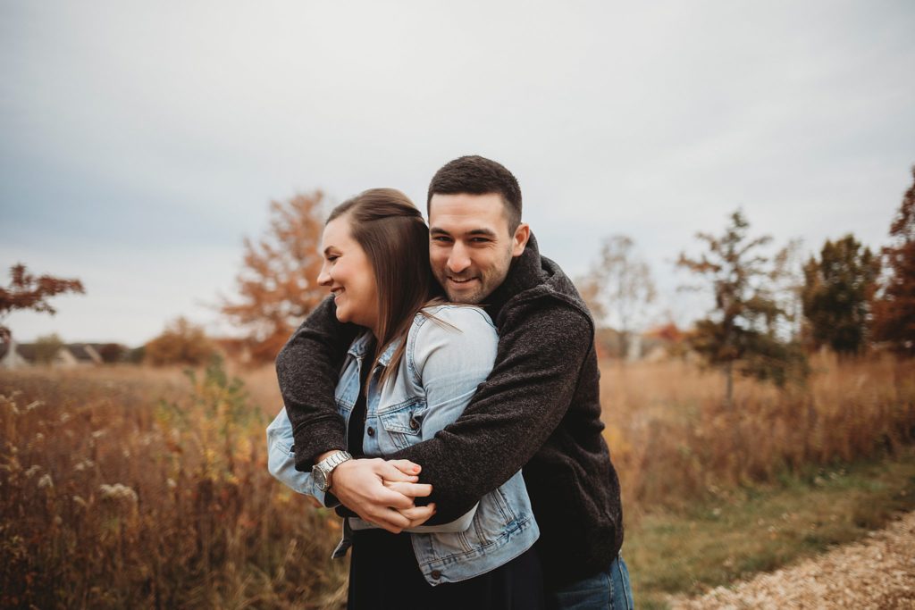 man hugs woman for their West Lafayette Couples Session