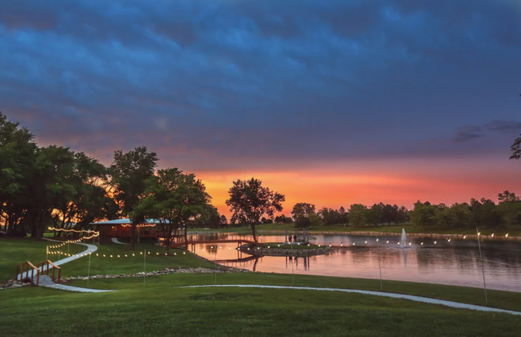 Midwest Airbnb Wedding Venues// How to Host an Airbnb Wedding - The Boathouse at sunset with view of  lakefront