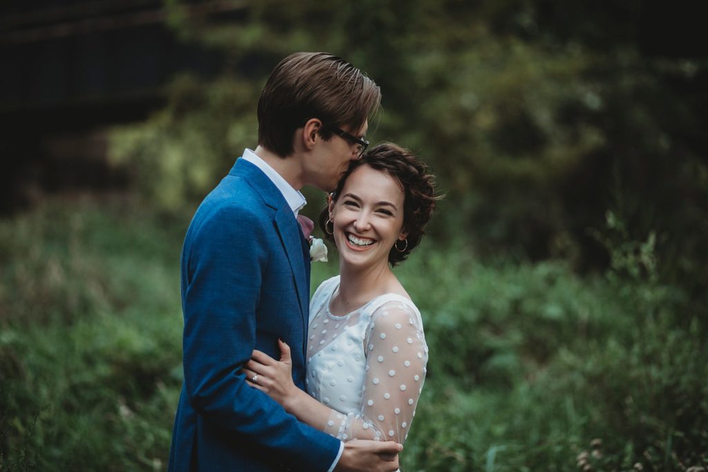 man and women embrace at their West Lafayette Indiana Elopement