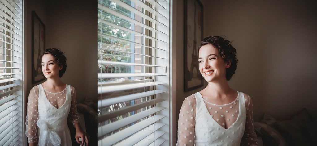 the bride looks off out the window before her West Lafayette Indiana Elopement