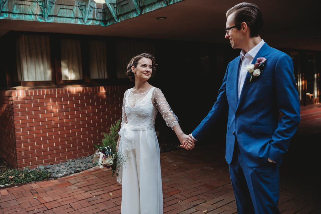 bride looks at groom for their west Lafayette elopement photos