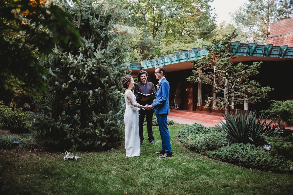 A couple sharing vows at the Samara House in West Lafayette, Indiana, one of the Small Wedding Venues in Indiana