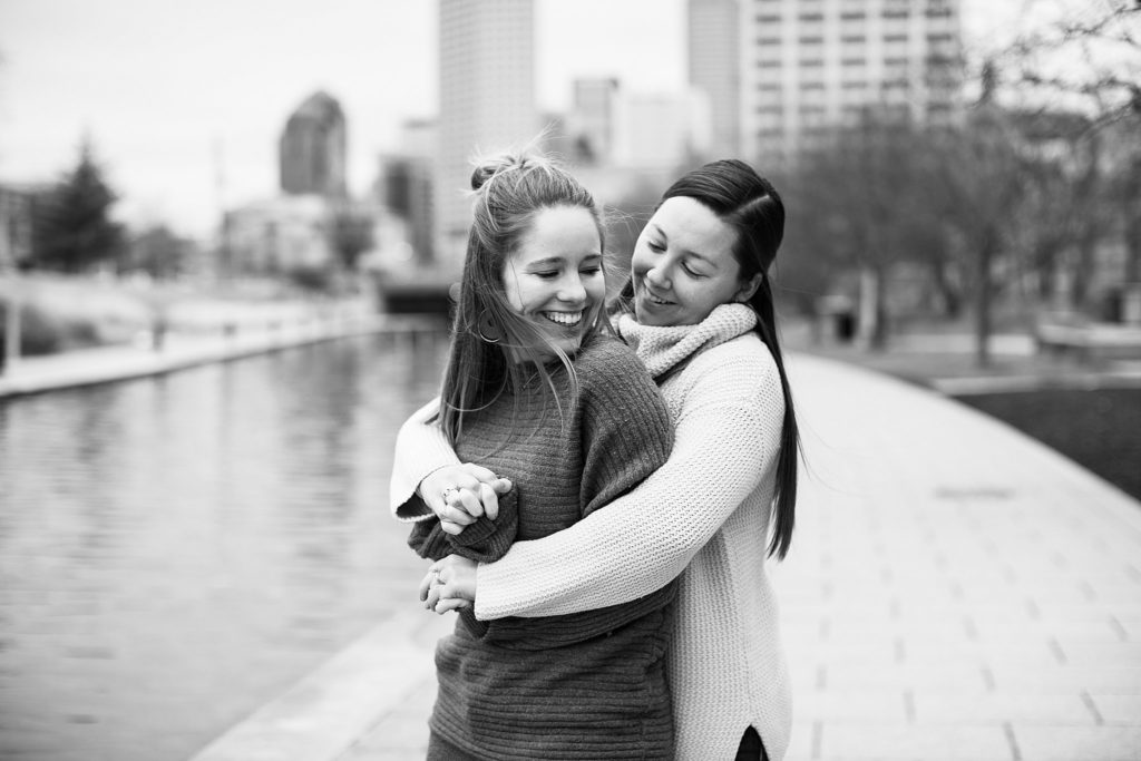lgbt photographers- two wives holding hands in downtown indianapolis indiana couples session. 