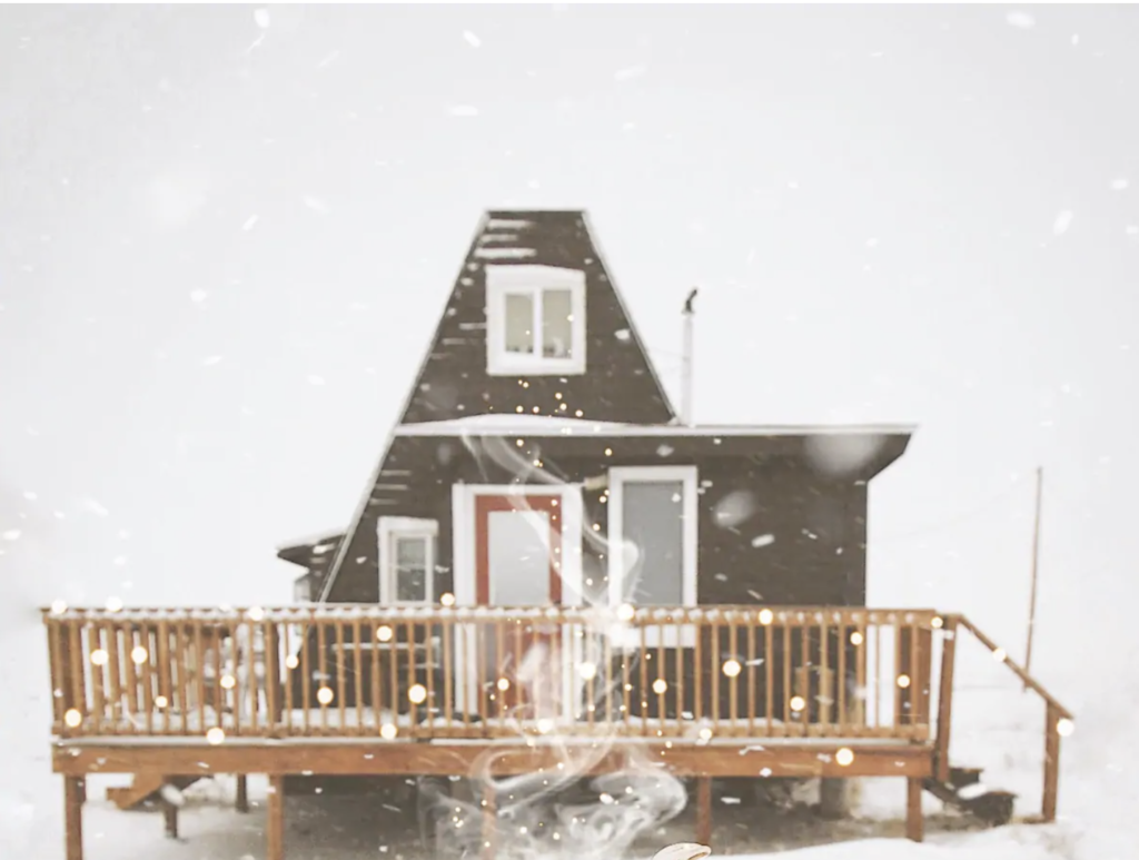 Best Colorado A-Frames- A-frame cabin during a blizzard in Fairplay, Colorado