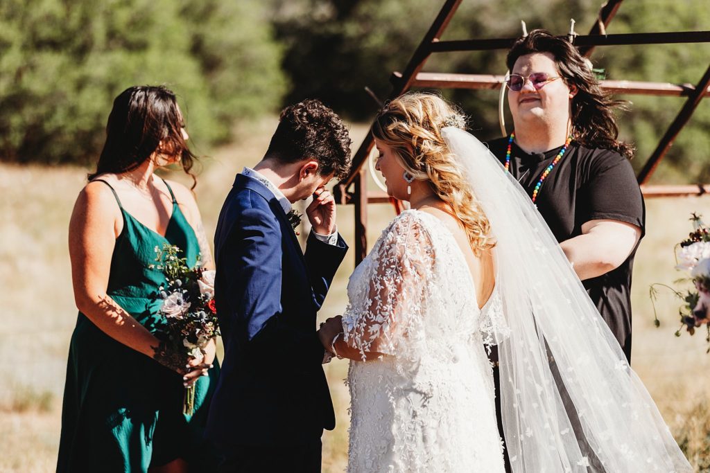 couple crying at their wedding ceremony at their utah elopement