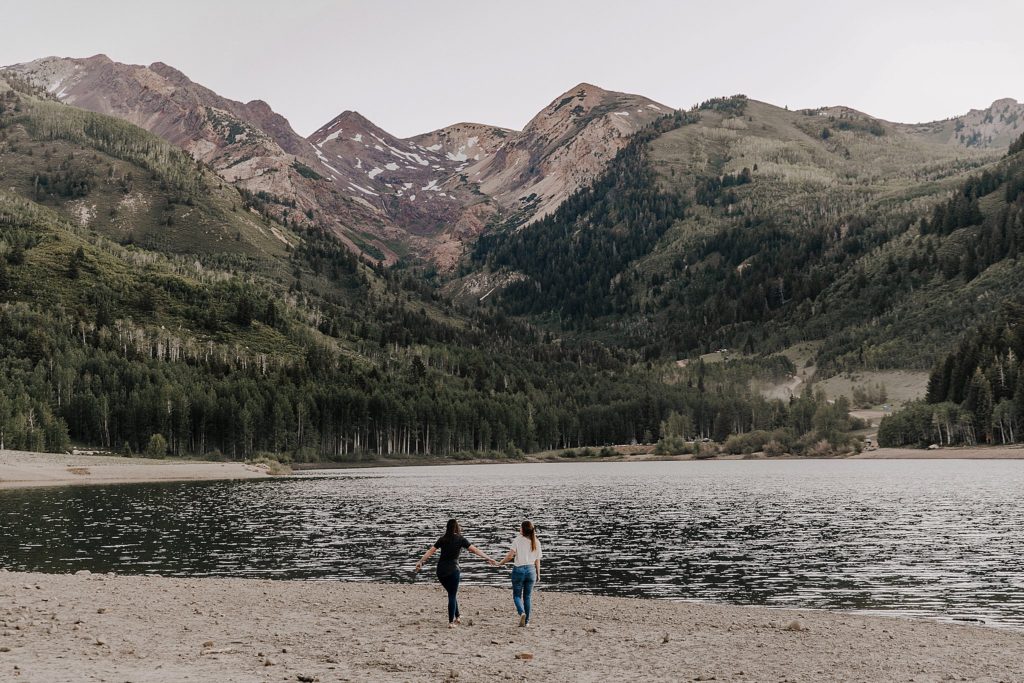 Most romantic Places in Utah to Propose- couple walking towards mountain