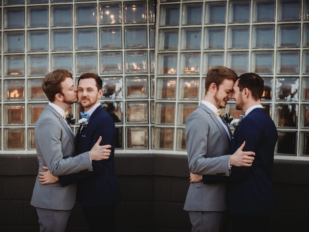 Two men leaning their heads together at an Indianapolis Wedding Venue called the ivory foundry