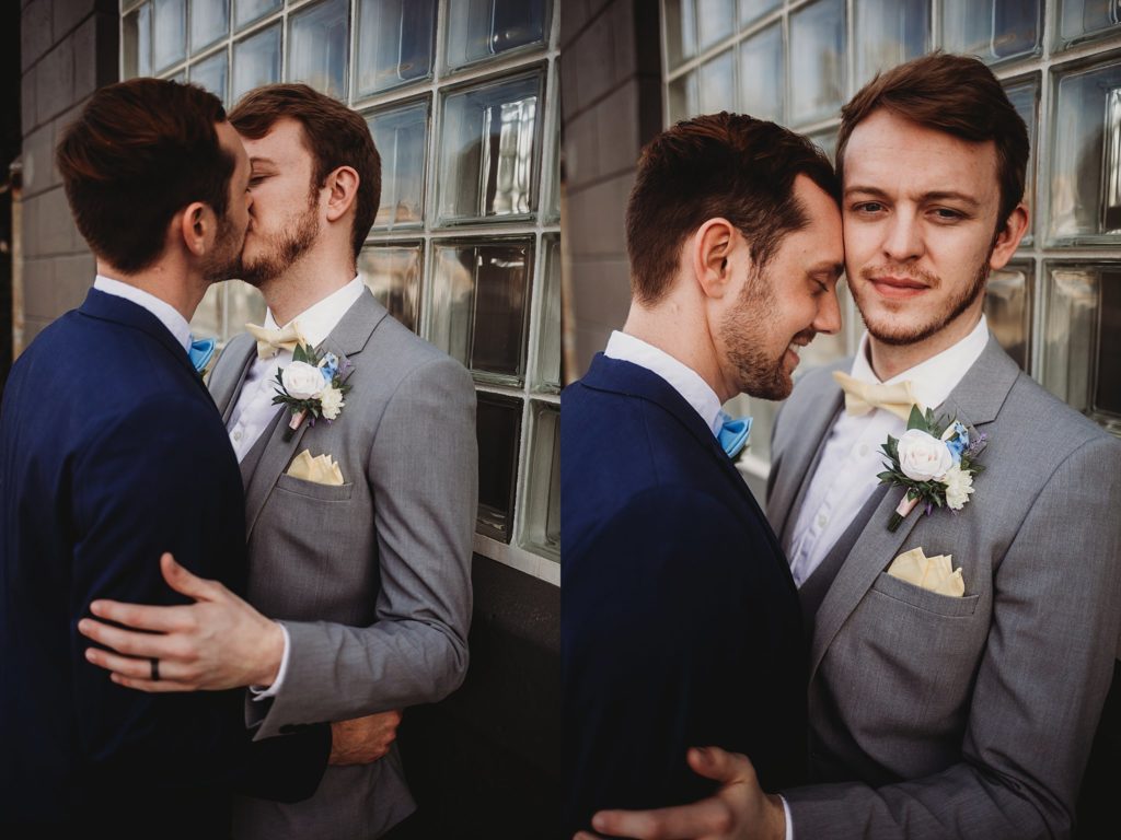 Two men kissing at an Indianapolis Wedding Venue called the ivory foundry