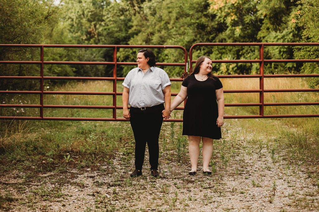 two women looking away from one another at their Indianapolis LGBTQ Engagement Session
