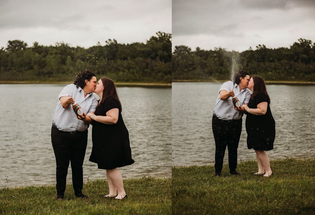 two women kissing and popping champagne at their Indianapolis LGBTQ Engagement Session