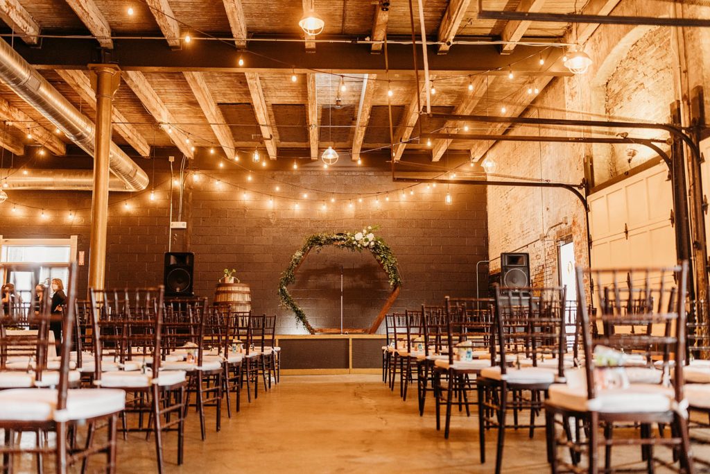 Rows of chairs that lead to an altar for a wedding at Indiana City Brewing Company