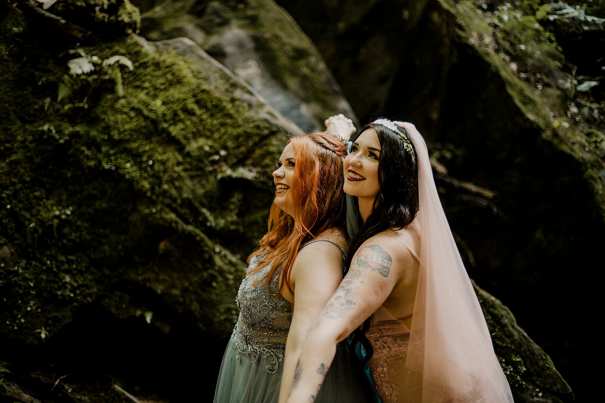 lgbtq elopement couple looking at each other while they are at turkey run in indiana